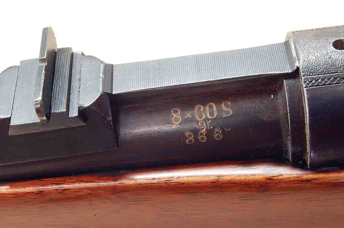 Gil’s rifle is marked “8x60S.”